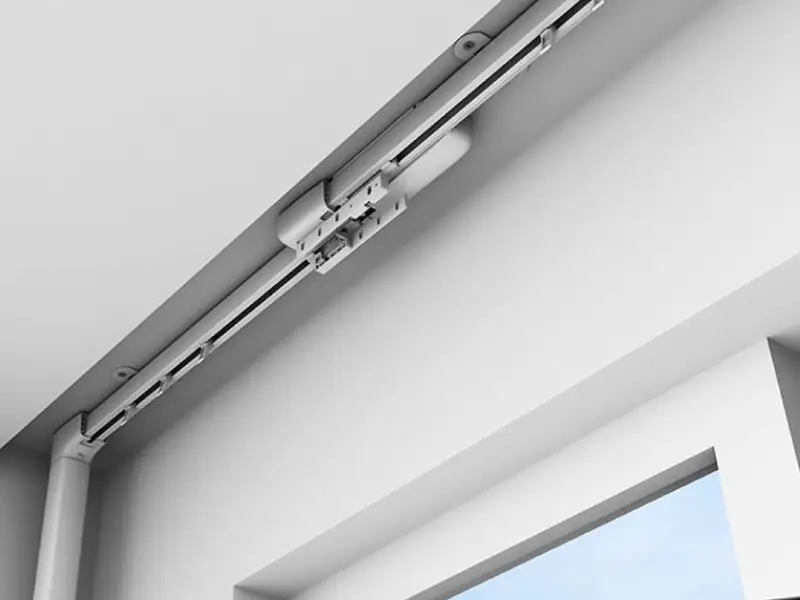 Motorized curtain track installed on a large window in a Qatar villa