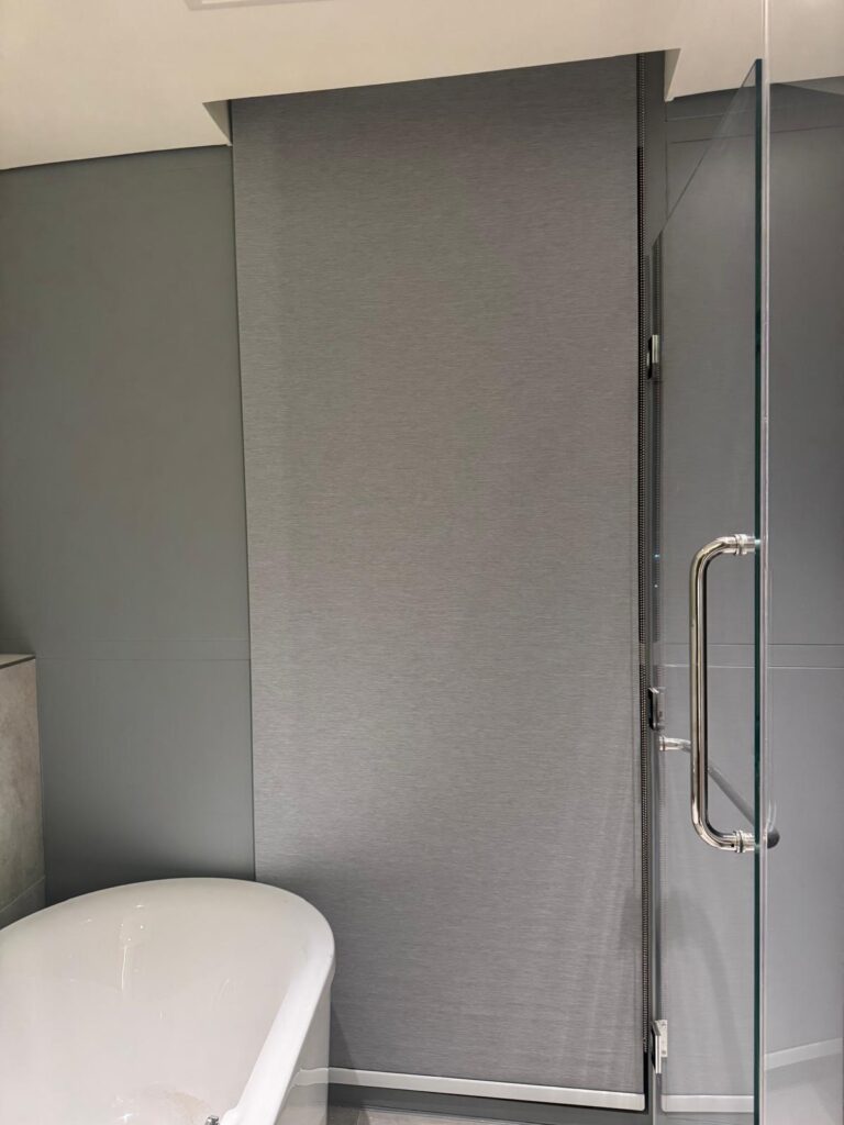 Blackout roller blinds installed in a residential room