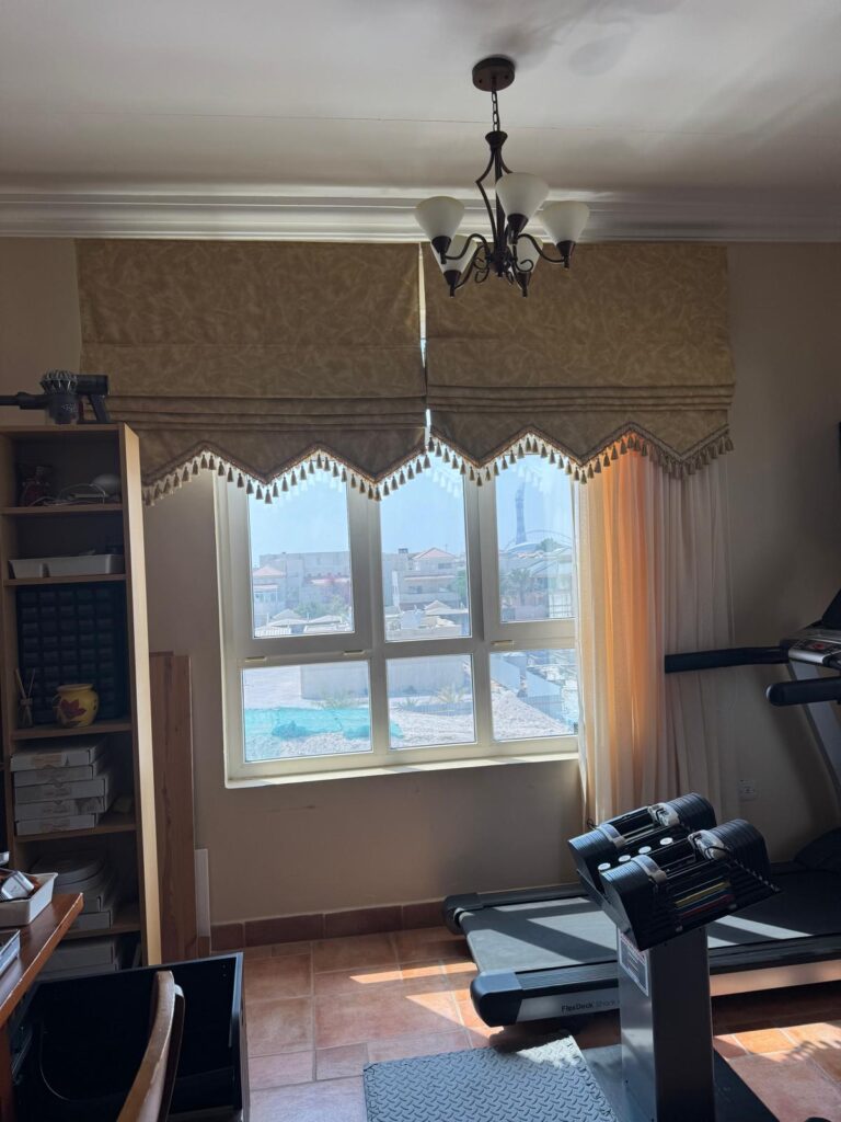 Motorized roller blinds installed on large windows
