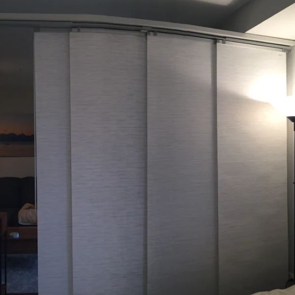Vertical blinds fitted to large windows in a Qatar residential property