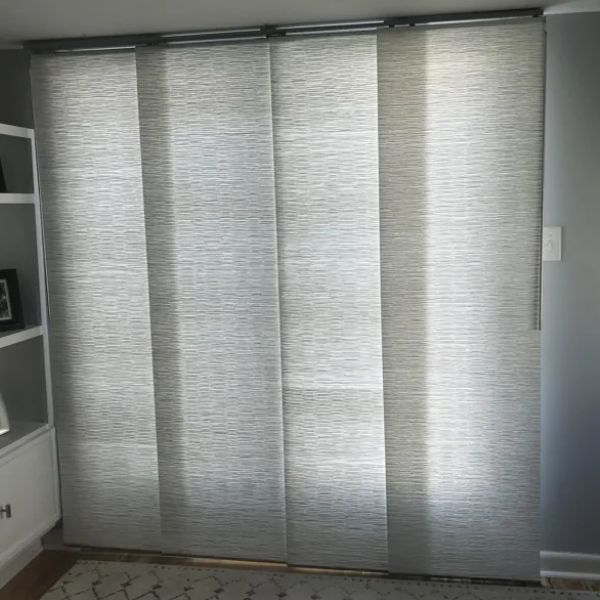 Vertical blinds installed in a modern villa living room in Qatar