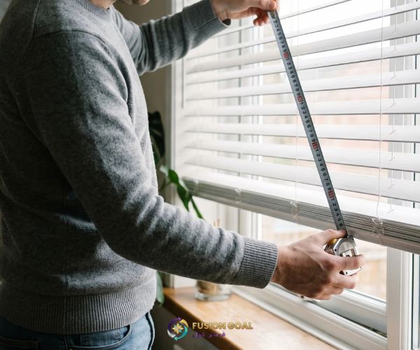 Custom roller blinds measured and prepared for windows in Qatar