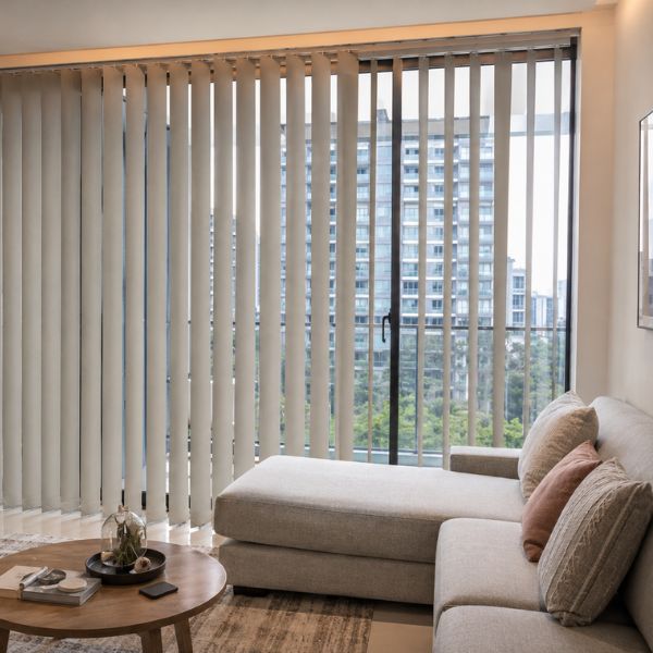 Vertical blinds covering a large window in a Qatar interior
